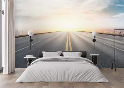 Panoramic city skyline and buildings with empty asphalt road at sunset Wall mural