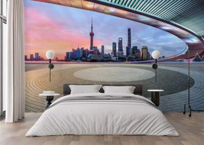 Panoramic skyline and modern commercial buildings with empty square floor in Shanghai at sunrise, China. empty floor and cityscape. Wall mural