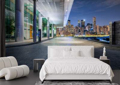 Pedestrian walkway and modern city commercial buildings scenery at night Wall mural