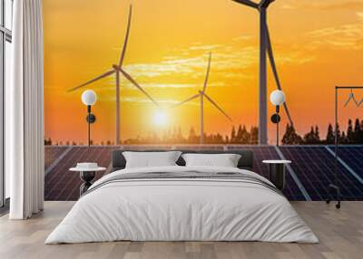 Wind turbines and solar panels at sunset. renewable energy concept. Wall mural