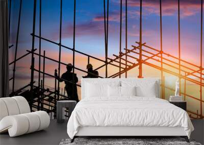 workers and construction site at sunset Wall mural