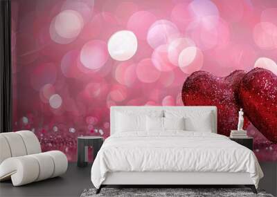 Two red hearts on a pink glitter background with many small glowing hearts in a bokeh effect banner design, conveying a Valentine's Day concept. Wall mural