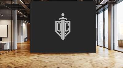 Letter OC logo with shield and sword icon design in geometric style Wall mural