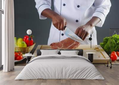 Chef cutting meat with knife on chopping board in kitchen. Cooking, Master chef Wall mural