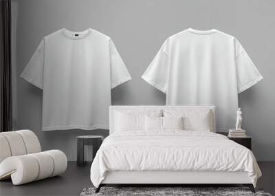 Front and back views a white oversized tshirt with blank space ideal for a mockup set against Wall mural