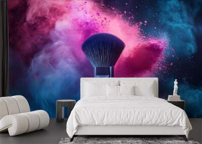 Two Soft cosmetic brushes release a cloud of colored smoke from bright eyeshadow and powder, cosmetics and beauty industry. Bright creative makeup, concept Wall mural