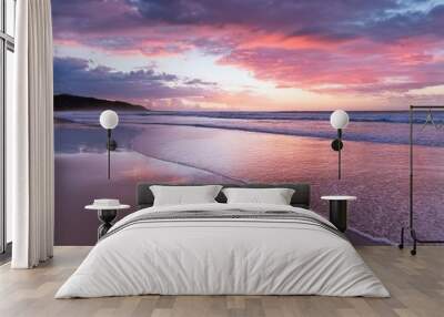 pastel pink sunset at beach reflecting off sand gold coast Wall mural