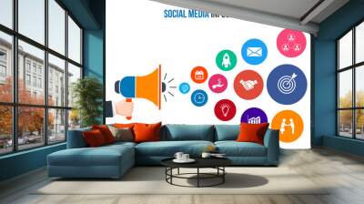 Hand holding megaphone with cloud of icons. Social media infographic. Wall mural