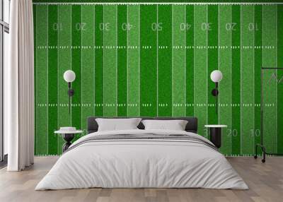 An American football field viewed from above, with vibrant green grass, crisp white yard lines, and end zones marked, creating a striking grid pattern Wall mural