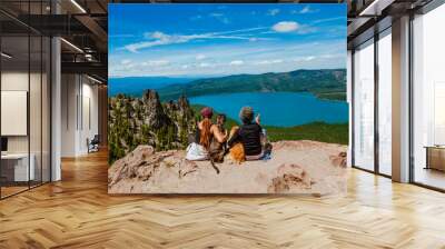 couple on the mountain with dogs Wall mural