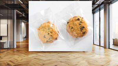 Cookie in plastic wrap packaging. Wall mural