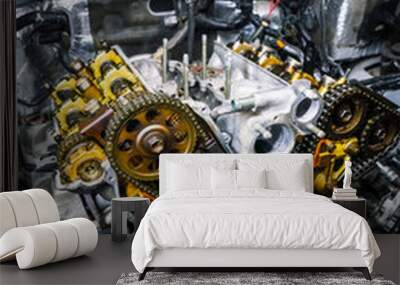 Car repair: type of open engine with drive chains and a large number of pulleys and parts. Wall mural