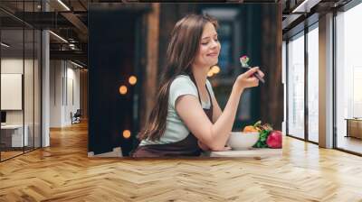 Attractive woman in the kitchen Wall mural