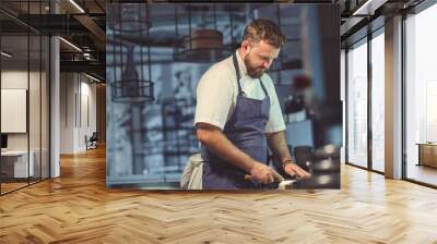 Young man in the kitchen Wall mural