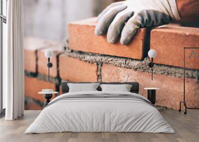 Close up of industrial bricklayer installing bricks on construction site Wall mural