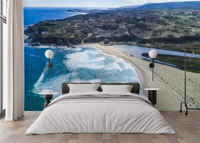 An aerial drone view over Tunquen Beach in Valparaiso region and close to Algarrobo, an awesome beach with a lot of wildlife because of it wetlands and turquoise waters, an idyllic travel destination Wall mural