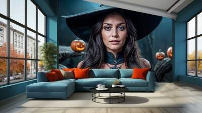 Halloween. Beautiful young witch casts a spell on Halloween Wall mural