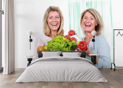 Two middle age woman with healthy food Wall mural