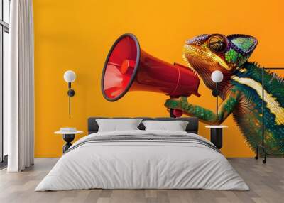 Creative announcement concept. A vibrant chameleon appears to be shouting into a megaphone against a solid orange background, showcasing a playful mix of wildlife Wall mural