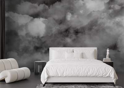 Textured soft white clouds of smoke and fog on black background with gray vintage high detail fluffy cloud distressed textured in the light, abstract natural bright sky background with dark effect. Wall mural