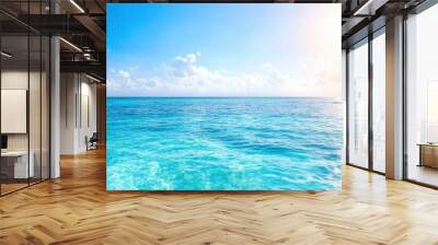 Blue ocean with sun reflection, sun shining on sky background Wall mural