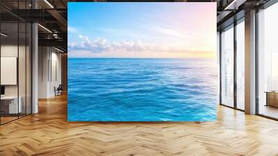 Blue ocean with sun reflection, sun shining on sky background Wall mural