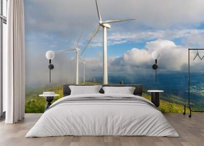 wind turbine on a green field Wall mural