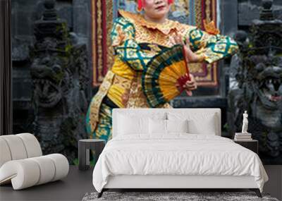 Balinese dancer woman in gold costume, Temple Bali Indonesia Wall mural