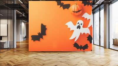 Happy halloween holiday concept. halloween decorations bats ghosts on orange background. halloween party greeting card mockup with copy space. flat lay top view overhead. Wall mural