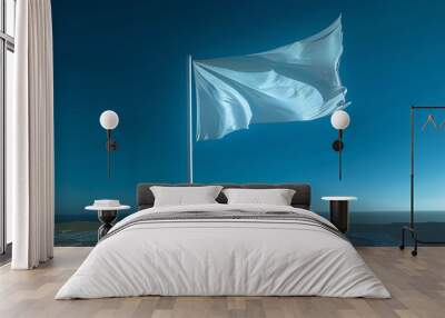 National flag fluttering in the wind with a clear blue sky and space for text Wall mural