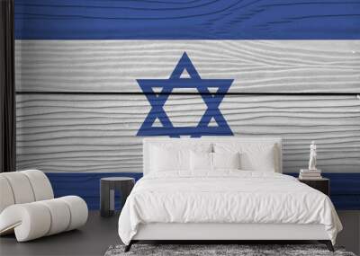 Flag of Israel on wooden wall background. Grunge Israeli flag texture, blue hexagram on a white background, between two blue stripes. Wall mural