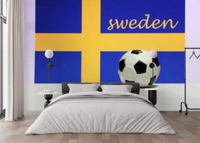 Small football on the white floor and Swedish nation flag with the text of Sweden background. The concept of sport. Wall mural