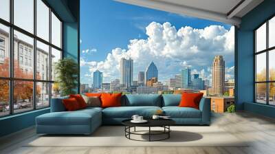 Downtown Atlanta Skyline showing several prominent buildings and hotels under a blue sky Wall mural