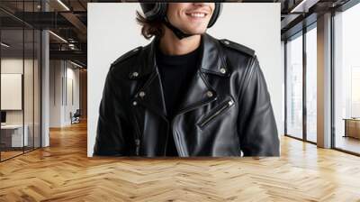 30 years old caucasian young male wearing a black leather jacket and helmet against white background Wall mural