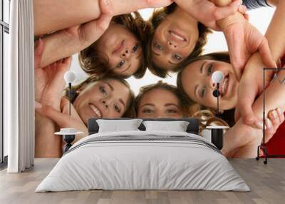 A group of young and happy smiling teenagers together Wall mural