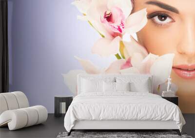 Beautiful face of young and healthy woman. Spa, cosmetology and healthcare. Wall mural