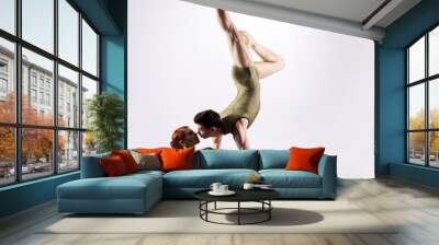 Couple of gymnasts on a light grey background Wall mural