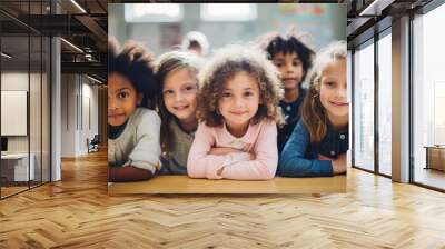 Happy children study in the classroom. A group of kids learn at school. Learning and education concept. Wall mural