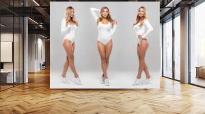 Young, fit and sexy girl in white swimsuit. Beautiful woman posing in studio. Collection collage. Wall mural