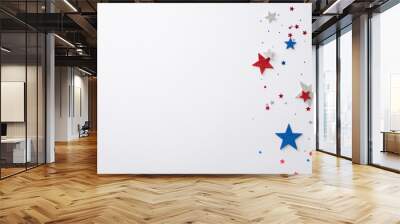 American Independence Day concept featuring top-view composition of festive party decorations: glitter stars and sparkle confetti against a white backdrop with empty space for text or advertising Wall mural