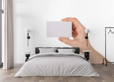 Cropped close up photo of human hand showing empty blank card with copy space isolated white background Wall mural