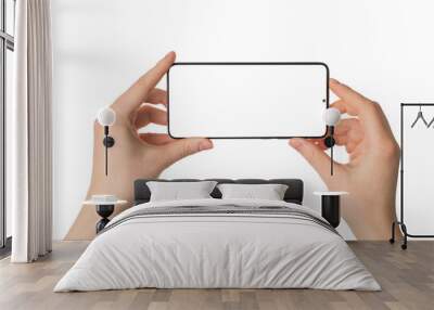 Shooting on smart phone concept. Close up photo pov of female hands holding smart gadget device in horizontal position taking making picture isolated white color background Wall mural