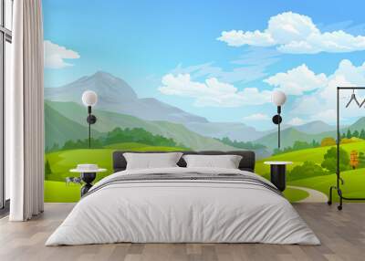 Cows grazing in green fields with huge mountains Wall mural