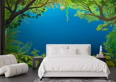 Sky blue background with nature-themed frame with trees, flowers, leaves, and a jungle. Wall mural