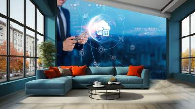 Big Data: Data analytics, businessman uses tablet and synchronizes with structure of data systems on network for working in the futuristic business, predictive insights, data-driven decisions........ Wall mural