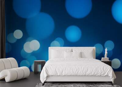 Blue bokeh lights on a blue background banner. Abstract blue background. Blue light dots banner. Wall mural