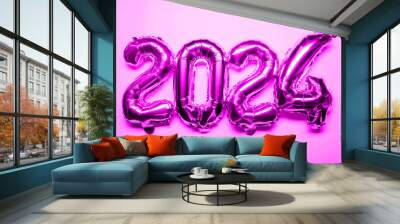 2024 New Year Concept - pink foil balloon and confetti Wall mural