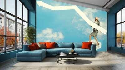 Businesswoman with arrow Wall mural