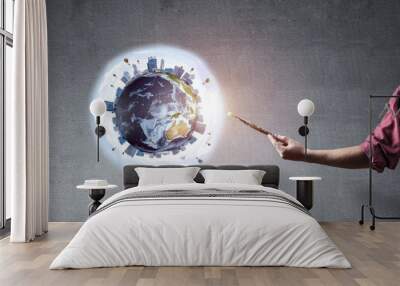 Close up artist hand drawing earth globe Wall mural