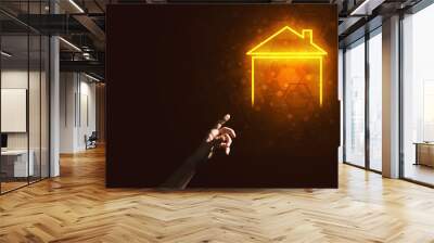 Conceptual image with hand pointing at house or main page icon on dark background Wall mural